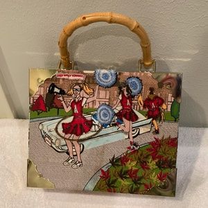 Vintage cigar purse..bamboo handle padded and leopard lined